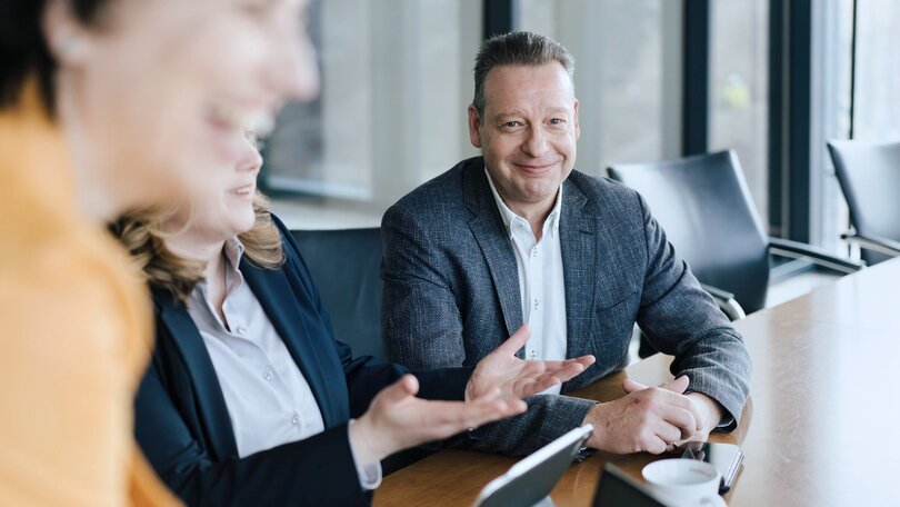 BAUHAUS Mitarbeiter im Meeting